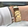TAŞ RAKAM TAŞ BEZEL GÜMÜŞ KADRANLI GOLD METAL KADIN KOL SAATİ