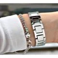 TAŞ RAKAM TAŞ BEZEL MAVİ KADRANLI ZİNCİR KORDONLU GÜMÜŞ METAL KADIN KOL SAATİ
