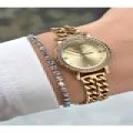 TAŞ RAKAM TAŞ BEZEL GOLD KADIN METAL KOL SAATİ